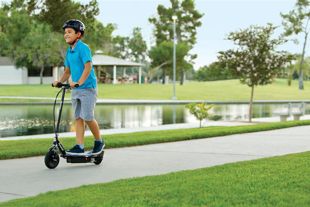 Razor E100 Glow Light - up Electric Scooter. up to 10 Mph. Air - Filled Front Tire. for Child Ages 8+